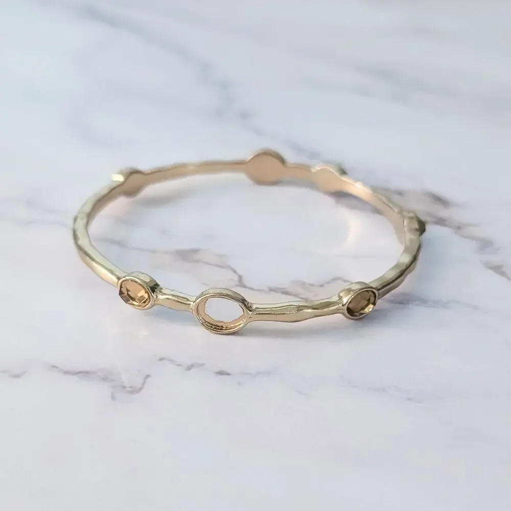 Gold Tone Bracelet - Bangle with Orange Accents - One Missing